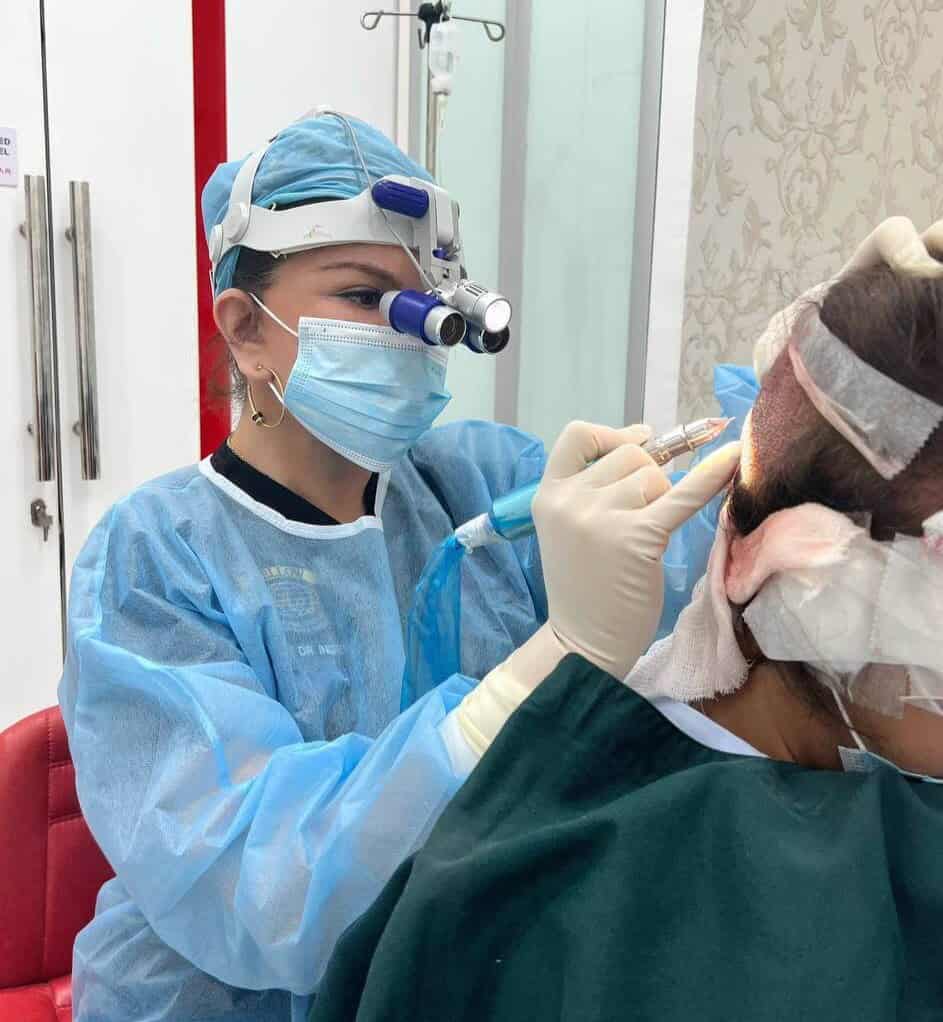 Dr Inder taking donor for hair transplant